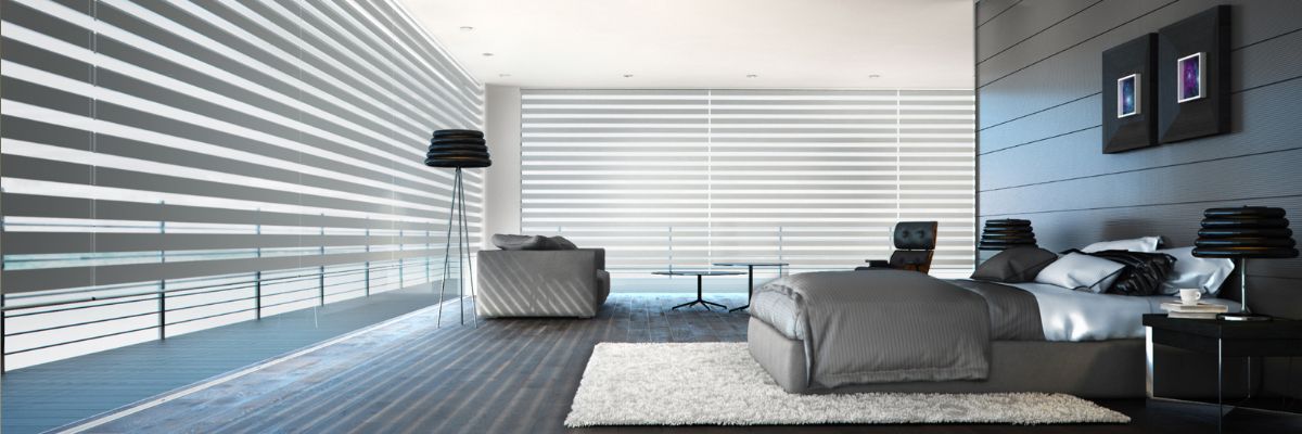 Grey Day and Night Blinds in a Bedroom