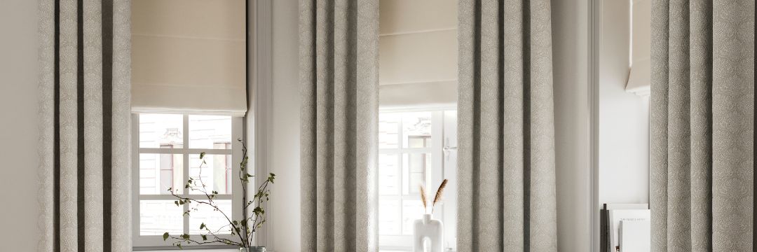 Layering Curtains and Blinds Room Darkening HBS 1080 x 360 Layering Curtains and Roman Blinds for better Room Darkening